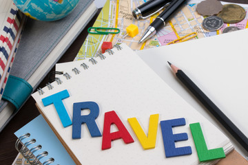 Travel planning with travel word alphabet. Template with planning items on traveler workplace. Planning vacation trip with travel alphabet.