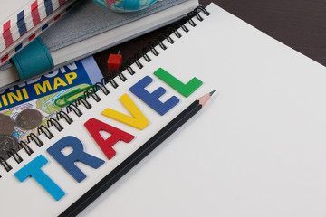 Travel planning with travel word alphabet. Template with planning items on traveler workplace. Planning vacation trip with travel alphabet.