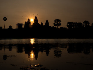 Fototapeta na wymiar Sunrise over Angkor Watt, Siem Reap, Cambodia