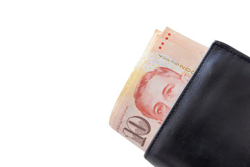 Singapore Dollars in a black wallet isolated on white background. clipping path