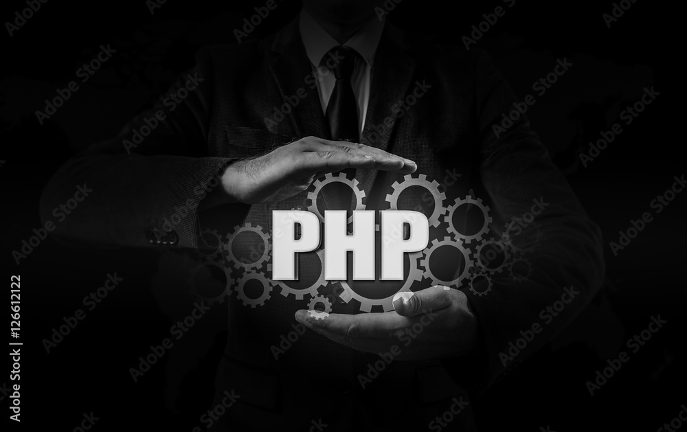 Wall mural technology and internet concept - businessman holds the php button on virtual screens