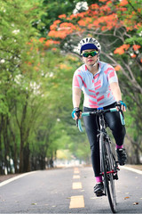 Woman ride bike, healthy lifestyle concept and sport motivation idea