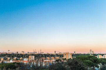 Madrid skyline cityscape at sunset time, Spain