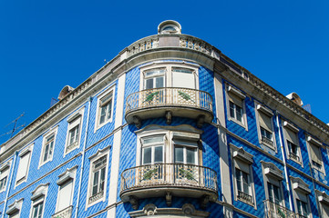 Lisbon buildings with typical traditional portuguese tiles on the wall in Lisbon, Portugal