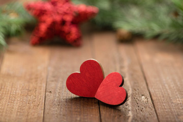 Two red wooden heart on the table. Christmas decoration. Copy space. Valentine. Love.