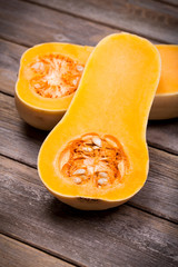 Sliced butternut squash over old wood