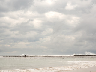 distant fishermen, Mollymook Beach, NSW, Australia