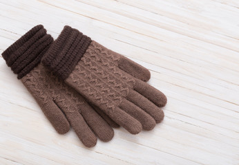 gloves on white wooden background