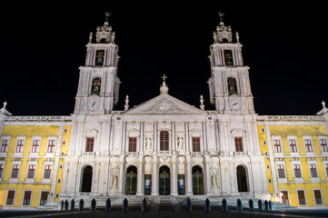 Fototapeta na wymiar The Palace of Mafra at night time - a monumental Baroque and Italianized Neoclassical palace-monastery located in Mafra, Portugal