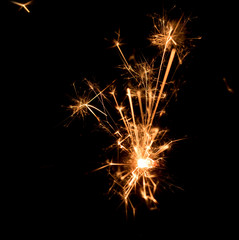 Christmas and new year party sparkler on black