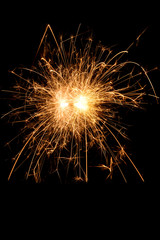 Fototapeta premium Christmas and new year party sparkler on black