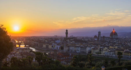 background view of the panorama of the old city of Florence, overlooking the Arno River, the Ponte Vecchio and the Duomo