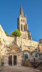 Fototapeta na wymiar Bell tower with Monolithic church of Saint Emilion - France