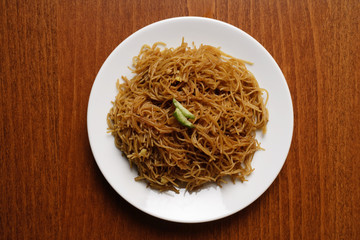 Chinese noodles on plate.