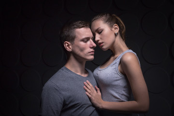 Passionate young couple in the room