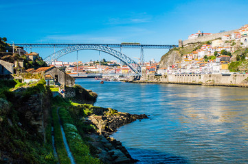Old Porto cityscape skyline with Dom Luis I Bridge and Douro River in Porto, Portugal