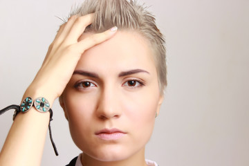Fototapeta premium portrait of a beautiful smiling girl with bracelet