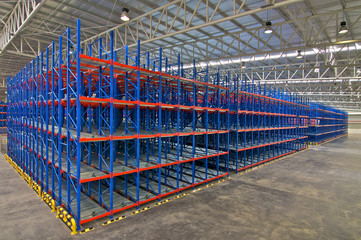 Storage system shelving metal pallet racking in warehouse.