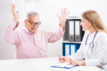 Happy patient is getting ecstatic when he heard the news of successful treatment.