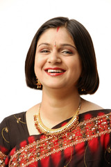 Indian woman in traditional clothing, looking at camera, head shot