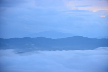 Landscape Mountain and mist in the morning at Doi Pha Chu in Si Nan National Park, Nan Province, Thailand