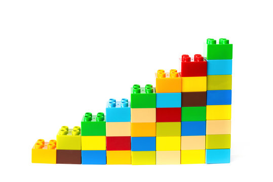 toy bricks shape as a growing trend on white background