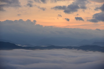 Fototapeta na wymiar Landscape Mountain and mist in the morning at Doi Pha Chu in Si Nan National Park, Nan Province, Thailand
