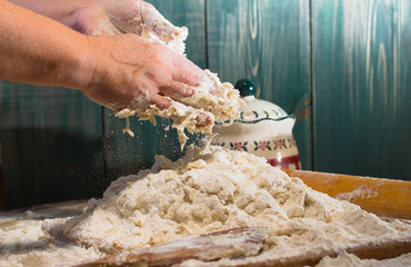 Woman knead dough