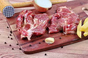 Ready raw fresh steak  for cooking .