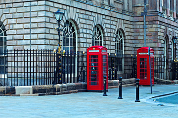 Pair of Classic British red phone box