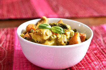White bowl with curry or asian food. Thai Curry.