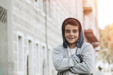 portrait of young boy in the city