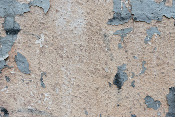 Wall fragment with scratches and cracks