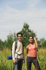 Young couple hiking in the wilderness