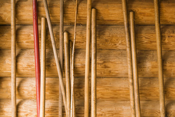 Brown timbered wall with sticks, background, texture