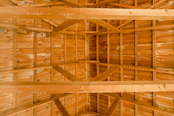 Wooden roof with beams, background