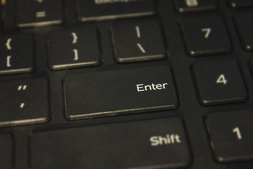 Close-up of enter key on computer keyboard