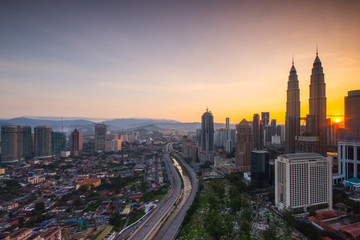 Fototapeta premium Kuala Lumpur city skyline during sunrise