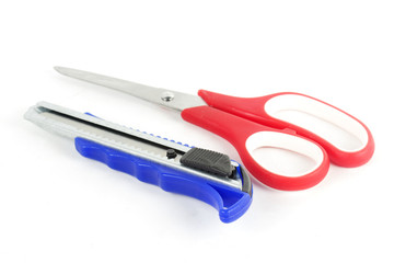 red scissors and blue cutter