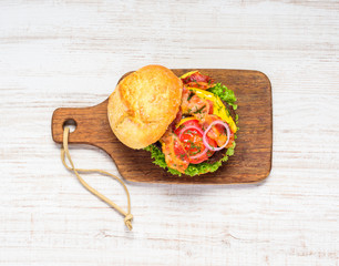 Burger with Bacon and Vegetables in Top View