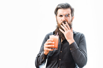 bearded man with nonalcoholic cocktail