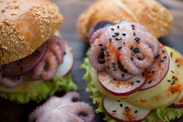 Close-up of burgers with spanish pulpo a la gallega stuffing