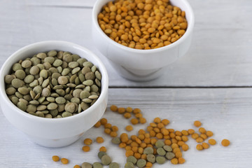 Red and green lentils in bowls