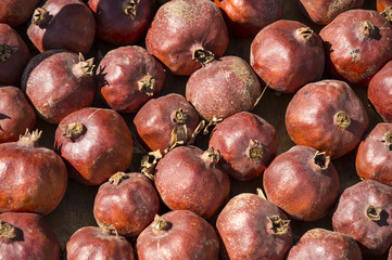 Background big juicy ripe pomegranate
