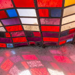 detail of sunbeam with colorful window