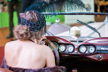 back Girl in retro convertible Vintage style, selective focus