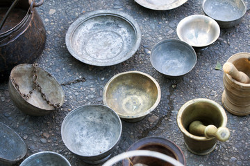 Antique implements utensils on the counter of flea market in Tbilisi. Georgia