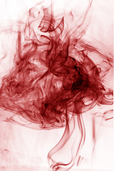 Toxic fumes movement on a white background..Red smoke movement o