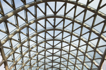 Bridge construction. Metal mesh framework of the bridge