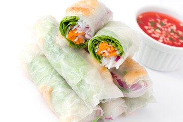 Vietnamese rolls with vegetables, rice noodles and prawns with sweet chili sauce isolated on white background

